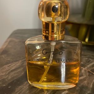 Giorgio Armani Gio eu de parfum 1.17 oz bottle about 60% full.